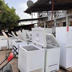 about-market Refrigerators and freezers for sale in an open-air appliance market