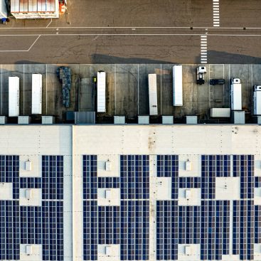 Solar panels mounted on the facade of a commercial building